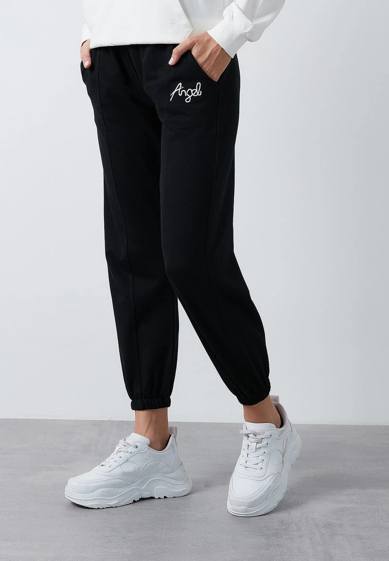 Pantalones deportivos - black LELA Pantalones Deportivos - Black , Mujer -LELA Ventas 2024 0e6e738324454ce88ed81fc35805b77b