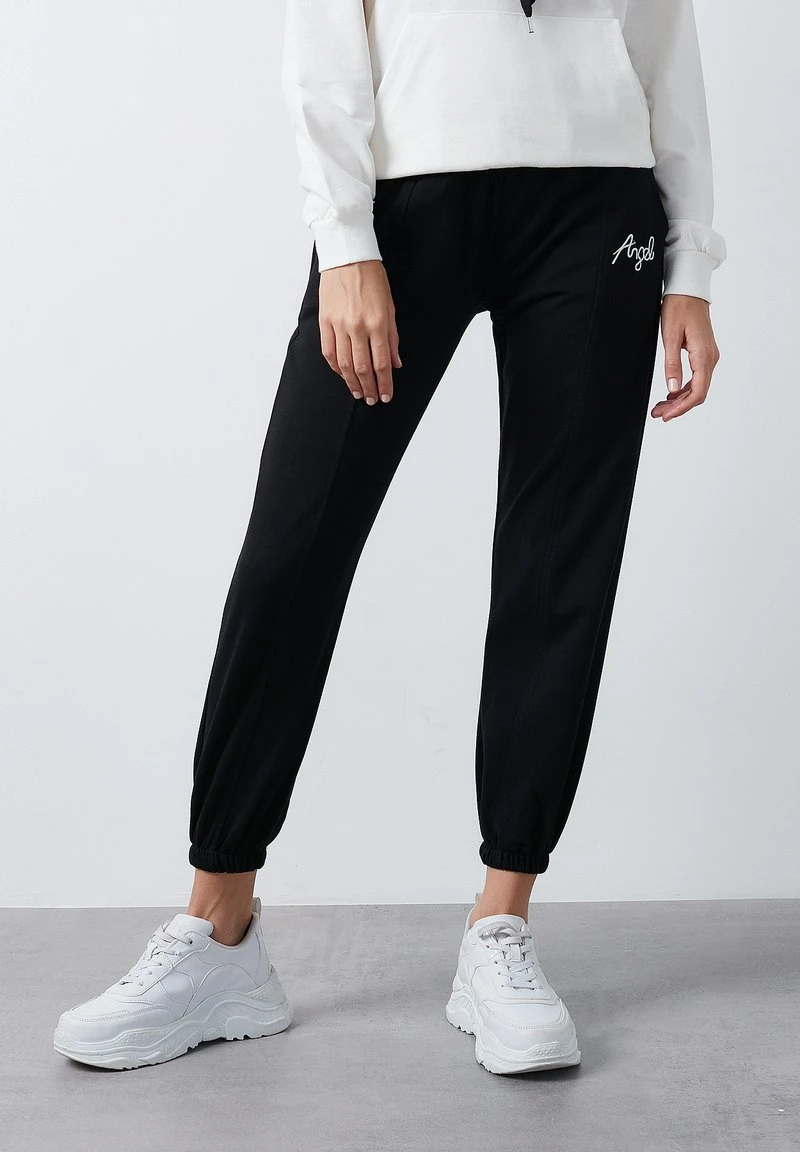 Pantalones deportivos - black LELA Pantalones Deportivos - Black , Mujer -LELA Ventas 2024 46c041d765f74741ad3c6ca93310dbfc