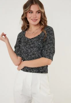 LELA Blusa - Black , Mujer 3 LELA Blusa - Black , Mujer -LELA Ventas 2024 518384e44e6f43f3977290e13dce3849