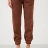 LELA Pantalones Deportivos - Biscuit Color , Mujer