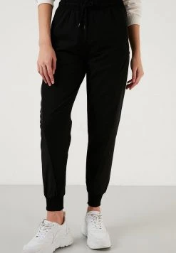 LELA Pantalones Deportivos - Black, Mujer