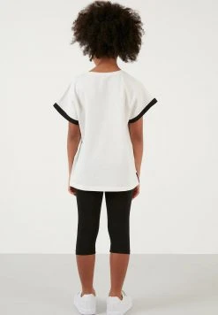 LELA REGULAR FIT - Leggings - Off White/black , Niños -LELA Ventas 2024 b86fa763cd2f4e7da21530b7d835586c